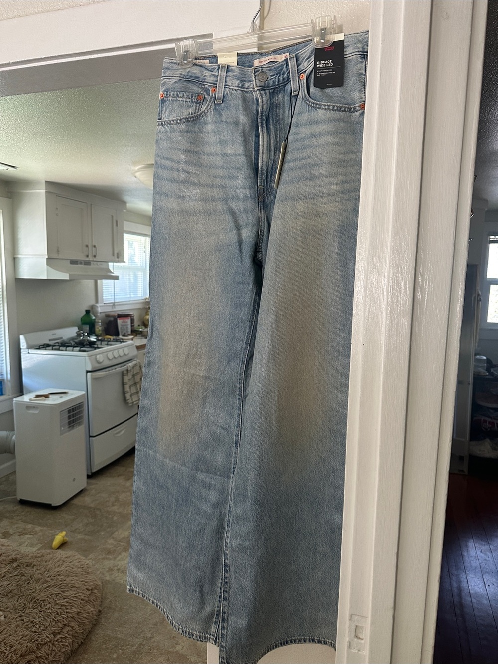 NWT! ‘High Gloss” ribcage wide leg jean. Size 30x34